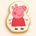 Custom silhouette cookie with a pink cartoon pig design